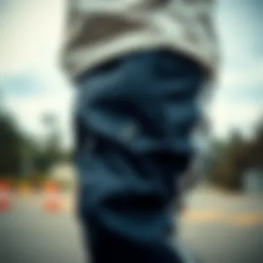 A detailed view of the button-up closure feature on Adidas pants, emphasizing design innovation.