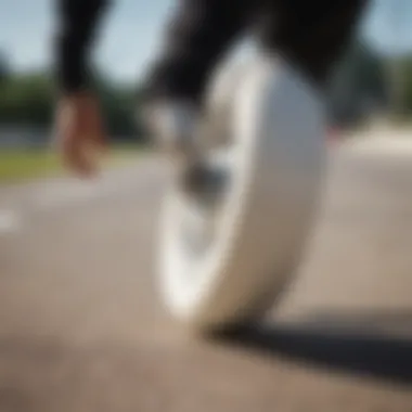 White longboard wheels in action on a smooth surface