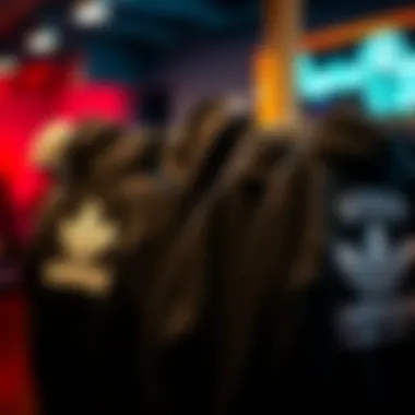 A collection of black hoodies from various skate brands on display.