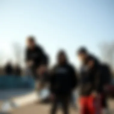 Skateboarders wearing the Black Russell Hoodie