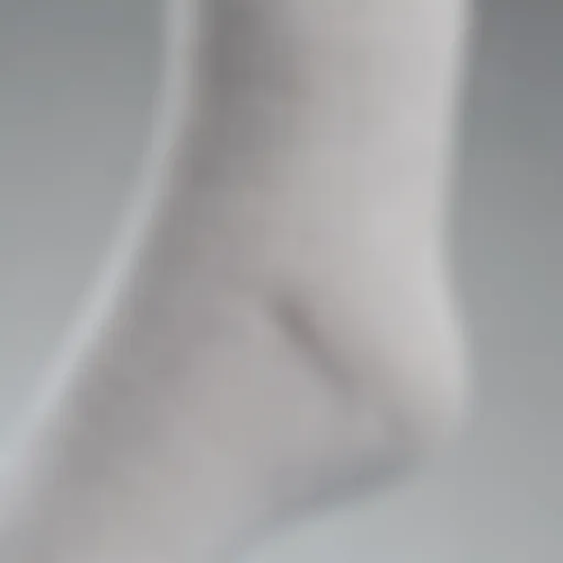 Close-up view of Champion white ankle socks highlighting the fabric texture