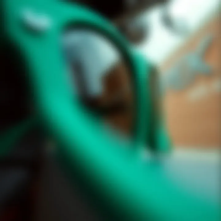 Close-up of the detailing on matte green Ray-Ban Wayfarers.