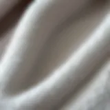 A close-up of soft club fleece fabric highlighting texture and quality