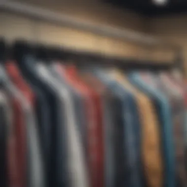 A collection of various all over print button up shirts displayed on hangers.