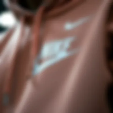 Close-up of Nike hoodie design with Swoosh logo