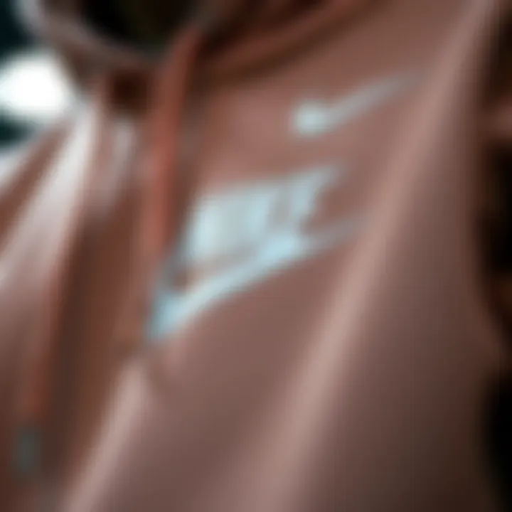 Close-up of Nike hoodie design with Swoosh logo