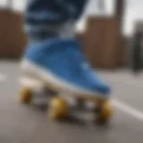 A close-up of blue bandana Air Force sneakers resting on a skateboard