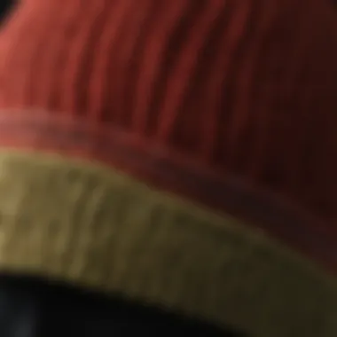 A close-up of a designer fisherman beanie showcasing intricate knit patterns.