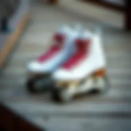 A pair of sleek adult roller blades resting on a wooden surface
