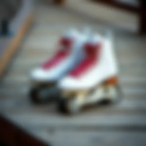 A pair of sleek adult roller blades resting on a wooden surface