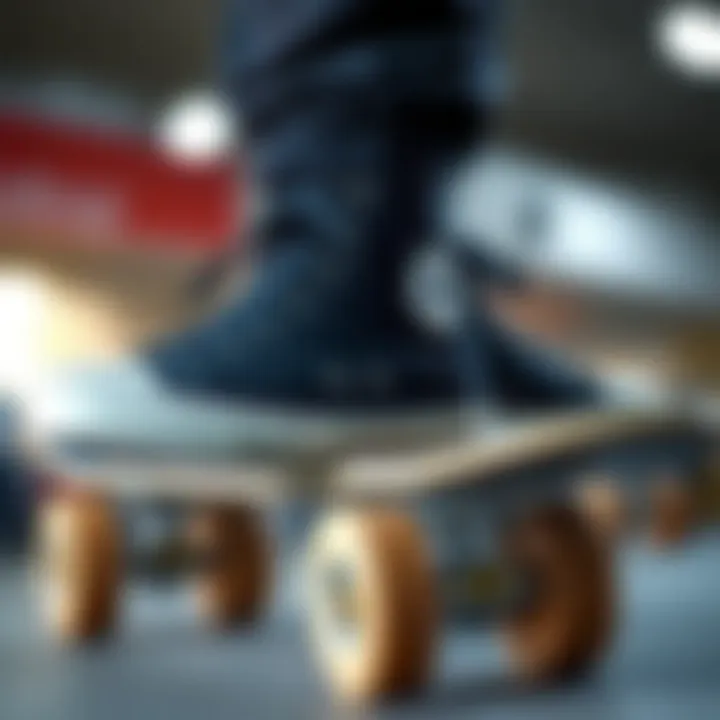 Black hi-top Converse sneakers on a skateboard