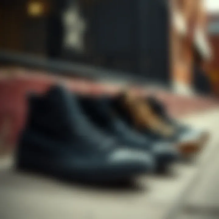 A collection of black on black Converse shoes displayed in an urban setting.