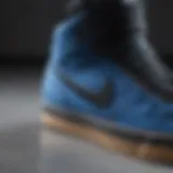 Close-up of blue black Nike shoes showcasing design details