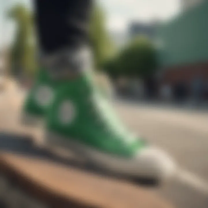 A pair of stylish green Converse shoes on a skateboard