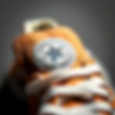 Emblem of Style and Performance Close-up of the Converse logo on light brown high top shoes