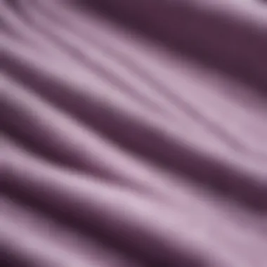 Close-up of the fabric technology used in lilac Nike sweatpants.