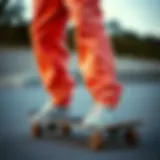 Fashion Meets Functionality Stylish display of Nike Peach Sweatpants on a skateboard