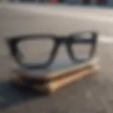 Close-up view of large black square glasses on a skateboard deck