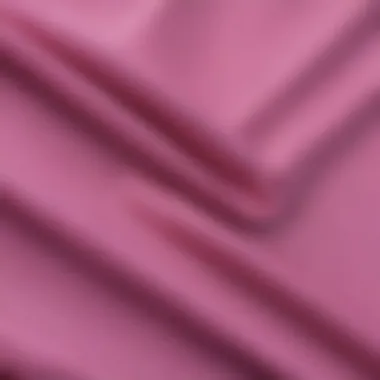 A close-up of pink and purple fabric textures, emphasizing color choices.