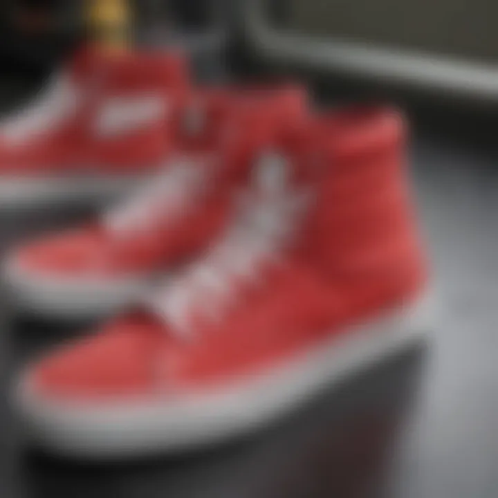 Close-up detail of the all-red hi-top Vans highlighting their design features