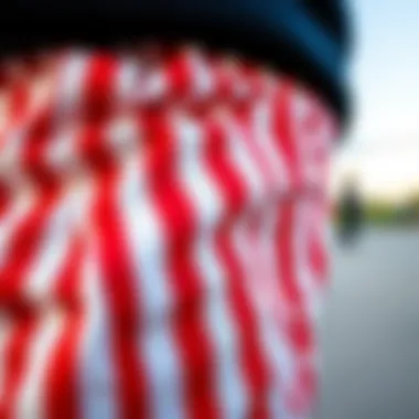 Close-up view of red and white striped pants showcasing the fabric texture