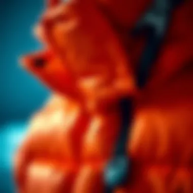 Close-up of neon orange puffer jacket details and textures