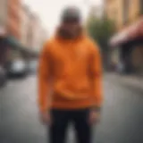 Close-up of the vibrant orange color of the Champion sweatshirt