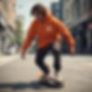 Skateboarder wearing the orange Champion sweatshirt in an urban setting