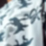 Close-up of the intricate fabric pattern of a white camo shirt