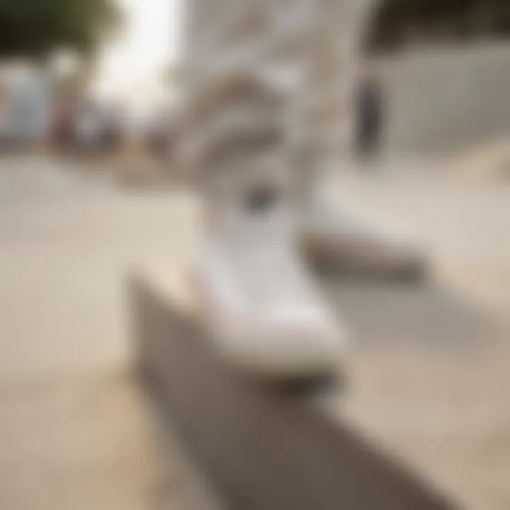 Skaters wearing white low rise Converse shoes in an urban skate park setting