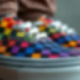 A close-up view of the vibrant Rainbow Checkerboard Vans showcasing the intricate design.