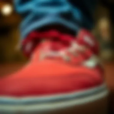 Close-up view of red leather Vans shoes showcasing texture and craftsmanship