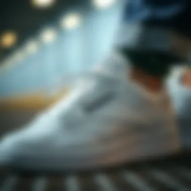 Elegant close-up view of Reebok Club C 85 trainers showcasing premium materials and subtle branding