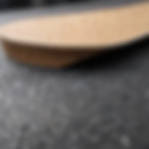 A close-up view of skateboard grip tape texture