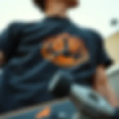 Detailed View of T-Shirt Design with Skateboard Close-up of black and orange t-shirt design elements with skateboard