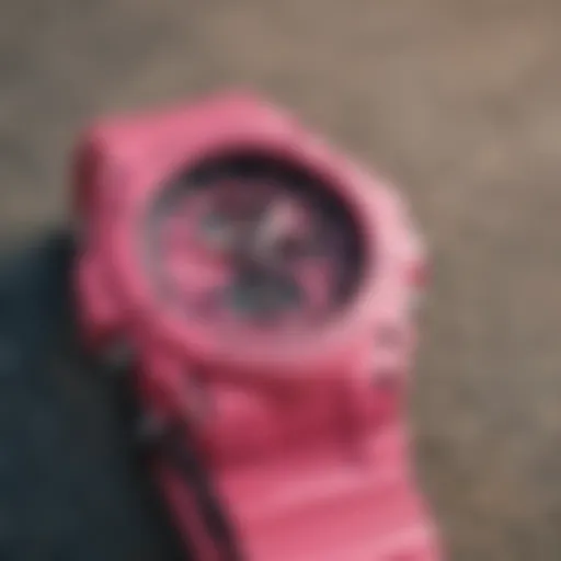 Stylish pink G Shock watch on a skateboard deck