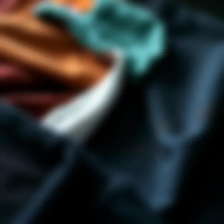 A close-up view of various fabric swatches used for t-shirt production, highlighting texture and color diversity.