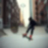 A skater wearing a black hood sweater performing a trick in an urban skate park.