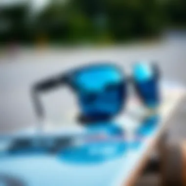 Stylish blue glass sunglasses on a skateboard deck