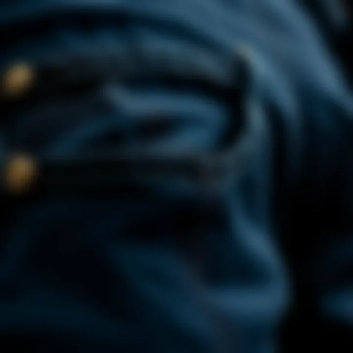 Close-up of black skinny fit jeans highlighting fabric quality and stitching