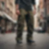 A stylish skateboarder showcasing camo cargo pants on the street