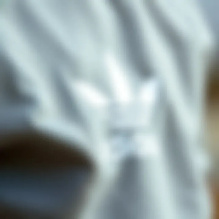 Fabric Texture of the Grey Adidas Sweatshirt Close-up of the fabric texture of a grey Adidas sweatshirt