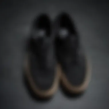 Close-up of black suede Vans highlighting their texture and material