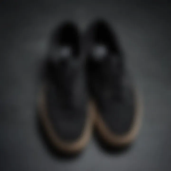 Close-up of black suede Vans highlighting their texture and material