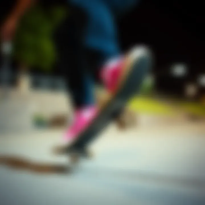 Skater performing a trick wearing pink Chuck Taylors