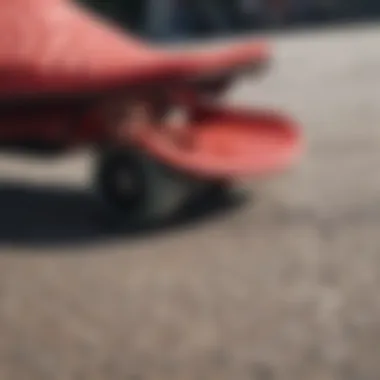 Close-up view of red Adilette slides on a skateboard