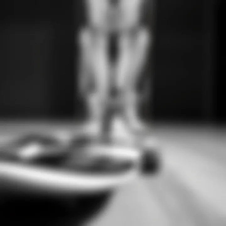 An artistic shot of a black and white skateboard deck, representing the aesthetics of skate culture.