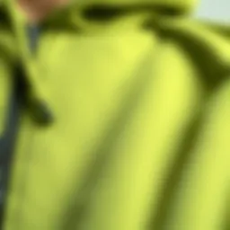 A close-up of the fabric texture of a zip-up hood sweatshirt, showcasing its durability and comfort.