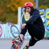 Goku performing a skateboard trick